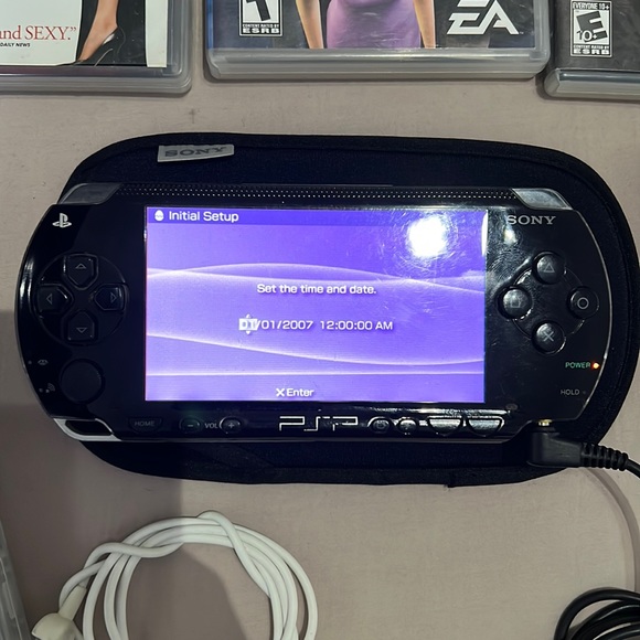 PSP w/ 6 games and charger and headset converter - Picture 8 of 8